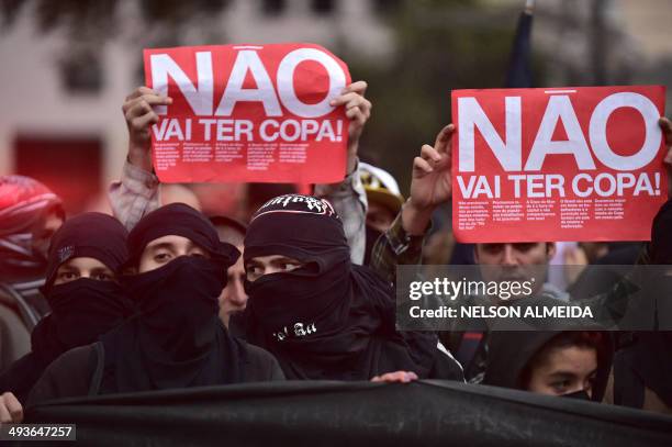 Demonstrators protest against the upcoming FIFA World Cup Brazil 2014 in Sao Paulo, Brazil on May 24, 2014. As the FIFA World Cup clock ticks down,...