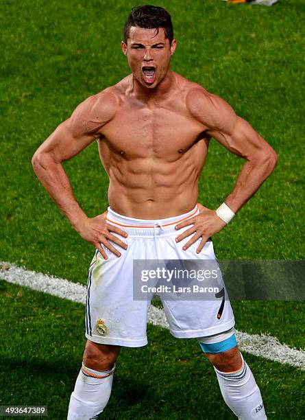 Cristiano Ronaldo of Real Madrid celebrates scoring their fourth goal from the penalty spot during the UEFA Champions League Final between Real...