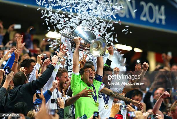 Iker Casillas of Real Madrid lifts the Champions League trophy during the UEFA Champions League Final between Real Madrid and Atletico de Madrid at...