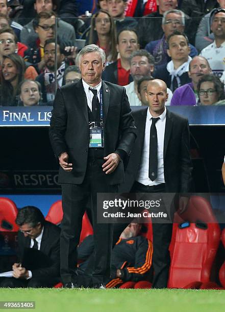 Coach of Real Madrid Carlo Ancelotti and his assistant Zinedine Zidane look on during the UEFA Champions League final between Real Madrid and...