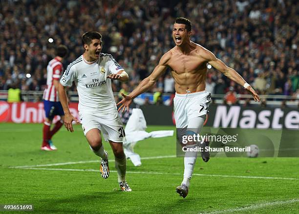 Cristiano Ronaldo of Real Madrid celebrates with Alvaro Morata of Real Madrid after scoring their fourth goal from the penalty spot during the UEFA...