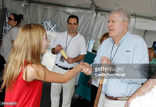 Performer Jackie Evancho shakes hands with Jerry Colbert, Executive Producer, National Memorial Day Concert, backstage at the 25th National Memorial...