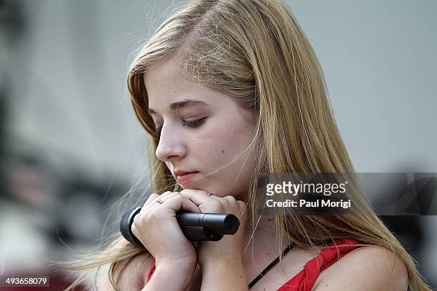 Jackie Evancho performs at the 25th National Memorial Day Concert rehearsals at U.S. Capitol West Lawn on May 24, 2014 in Washington, DC.