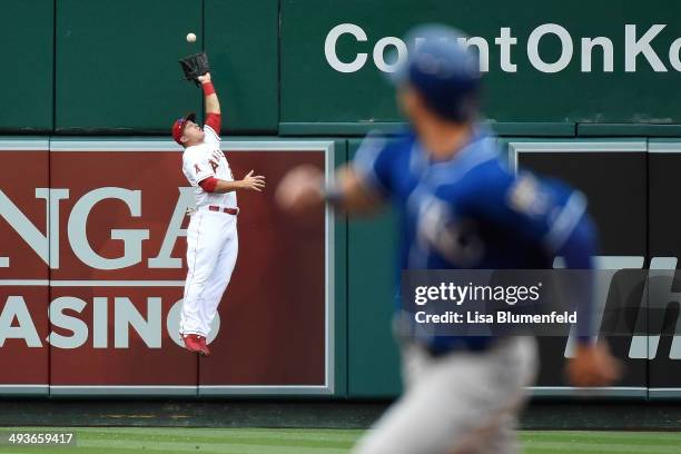 Mike Trout of the Los Angeles Angels of Anaheim catches a fly ball in the fourth inning against the Kansas City Royals at Angel Stadium of Anaheim on...