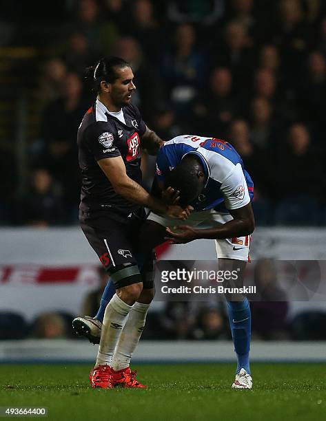 Hope Akpan of Blackburn Rovers clashes with Bradley Johnson of Derby County during the Sky Bet Championship match between Blackburn Rovers and Derby...