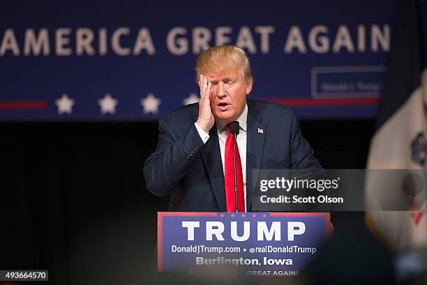 Republican presidential candidate Donald Trump speaks to guests at a campaign rally at Burlington Memorial Auditorium on October 21, 2015 in...