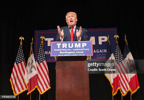 Republican presidential candidate Donald Trump speaks to guests at a campaign rally at Burlington Memorial Auditorium on October 21, 2015 in...