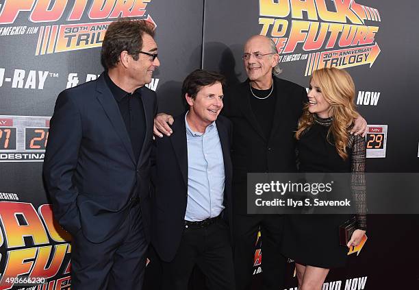 Huey Lewis, Michael J. Fox, Christopher Lloyd, and Lea Thompson attend the Back to the Future reunion with fans in celebration of the Back to the...