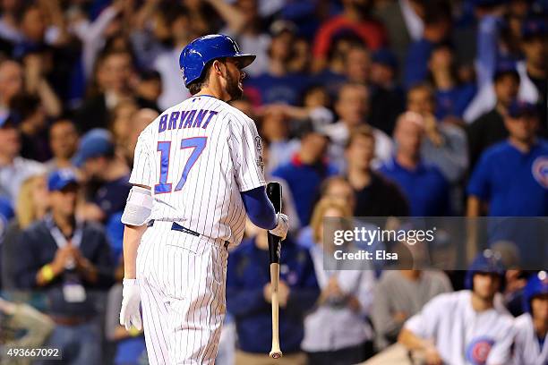 Kris Bryant of the Chicago Cubs reacts after striking out to end the fifth inning against the New York Mets during game four of the 2015 MLB National...