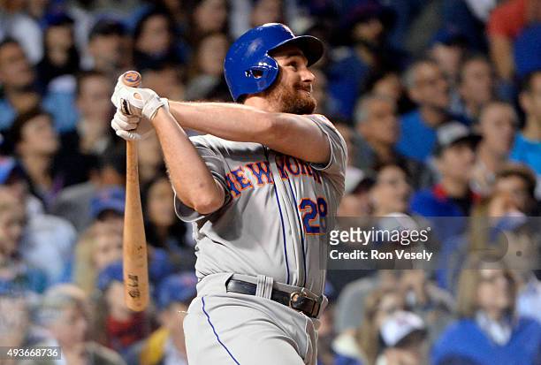Daniel Murphy of the New York Mets hits a two-run home run in the top of the eighth inning of Game 4 of the NLCS against the Chicago Cubs at Wrigley...