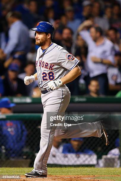 Daniel Murphy of the New York Mets celebrates after hitting a two run home run in the eighth inning against Fernando Rodney of the Chicago Cubs...