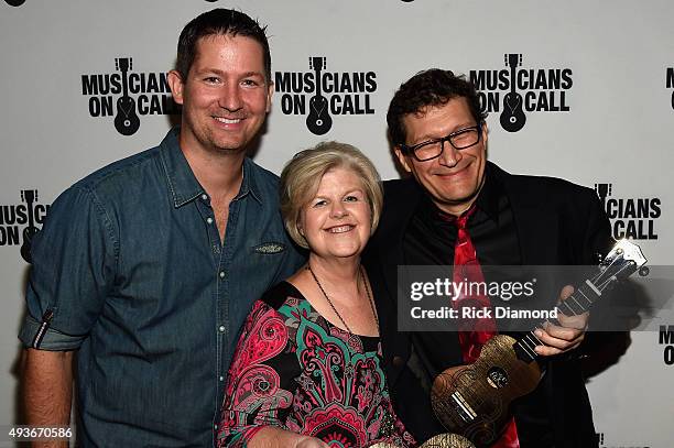 Musicians on Call President Pete Griffin and honorees Sandra Morgan and Harlan Pease attend the Musicians On Call Rock The Room Tour Kickoff Party at...