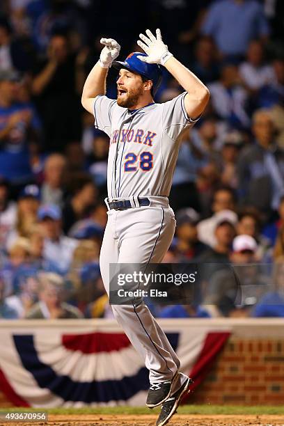 Daniel Murphy of the New York Mets celebrates after hitting a two run home run in the eighth inning against Fernando Rodney of the Chicago Cubs...