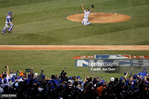 Jeurys Familia and Travis d'Arnaud of the New York Mets celebrate after defeating the Chicago Cubs in game four of the 2015 MLB National League...