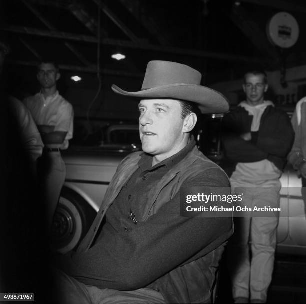 Actor James Arness waits on the set of "Gunsmoke" in Los Angeles, California.