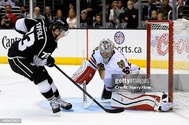 Tyler Toffoli of the Los Angeles Kings scores a second period goal past goaltender Corey Crawford of the Chicago Blackhawks in Game Three of the...