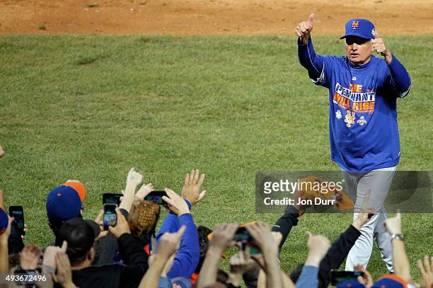 Manager Terry Collins of the New York Mets celebrates on field after defeating the Chicago Cubs in game four of the 2015 MLB National League...