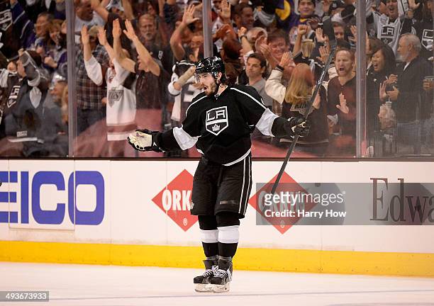 Drew Doughty of the Los Angeles Kings celebrates after he scores a third period goal against the Chicago Blackhawks in Game Three of the Western...