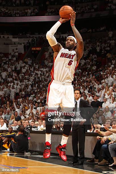 LeBron James of the Miami Heat takes a shot against the Indiana Pacers in Game Three of the Eastern Conference Finals during the 2014 NBA playoffs at...