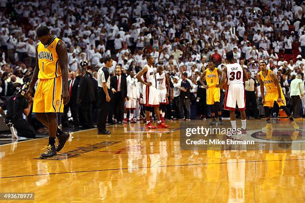 Lance Stephenson of the Indiana Pacers walks off the court after a play against the Miami Heat during Game Three of the Eastern Conference Finals of...