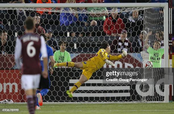 Goalkeeper Troy Perkins of the Montreal Impact is unable to reach the ball as Kamani Hill of the Colorado Rapids scores in the 54th minute at Dick's...