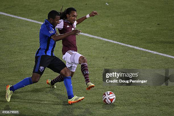 Patrice Bernier of the Montreal Impact and Marlon Hairston of the Colorado Rapids battle for control of the ball at Dick's Sporting Goods Park on May...