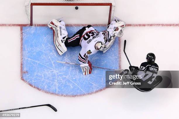 Tyler Toffoli of the Los Angeles Kings scores a second period goal past goaltender Corey Crawford of the Chicago Blackhawks in Game Three of the...