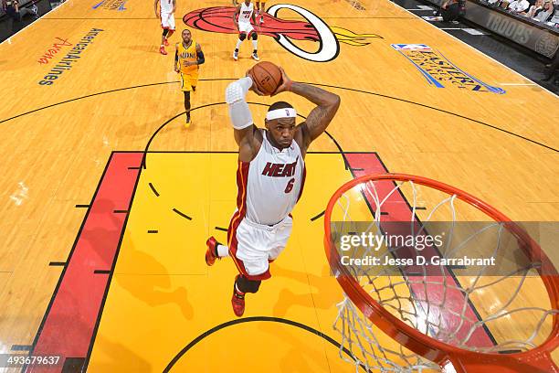 LeBron James of the Miami Heat goes up for the dunk against the Indiana Pacers in Game Three of the Eastern Conference Semifinals during the 2014 NBA...