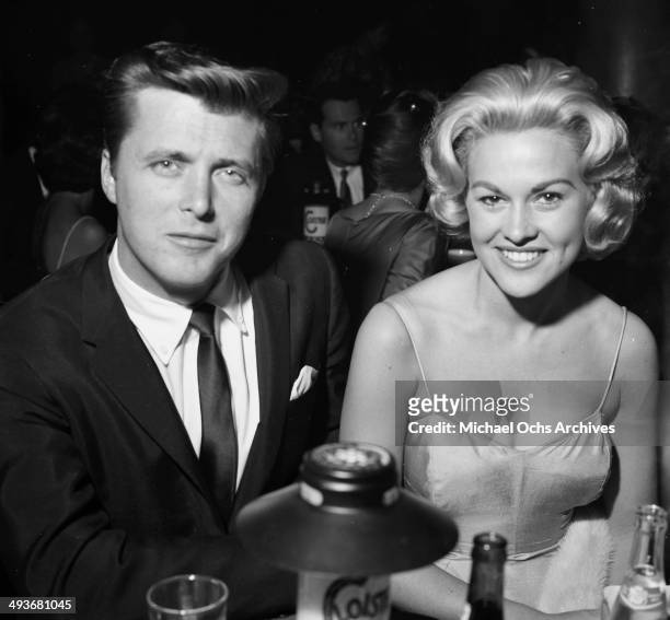 Actor Edd Byrnes with wife actess Asa Maynor attends a party in Los Angeles, California.