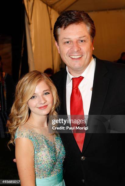 Jackie Evancho and Anthony Kearns pose for a photo backstage at the 25th National Memorial Day Concert rehearsals at U.S. Capitol West Lawn on May...