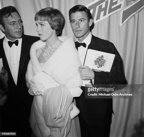 Actress Julie Andrews with actor Christopher Plummer and Roddy McDowall attend the premiere of "Sound of Music" in Los Angeles, California.