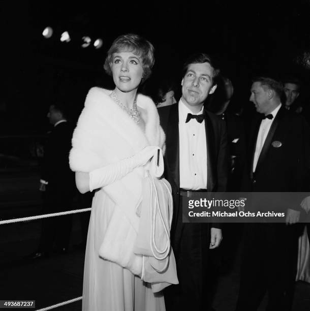 Actress Julie Andrews with husband Tony Walton attend the premiere of "Sound of Music" in Los Angeles, California.