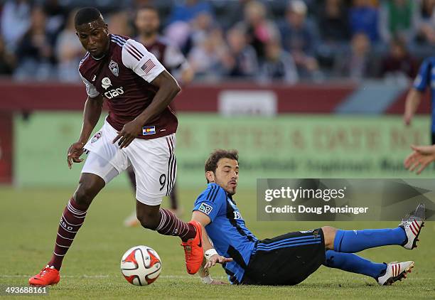 Edson Buddle of the Colorado Rapids controls the ball against Hernan Bernardello of the Montreal Impact at Dick's Sporting Goods Park on May 24, 2014...