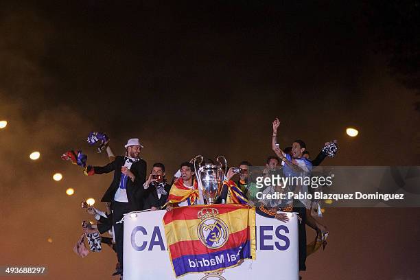 Real Madrid players Sergio Ramos, Cristiano Ronaldo, Pepe, Jesus Fernandez, Marcelo and Angel Di Maria arrive on a bus to celebrate their victory In...