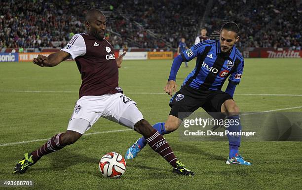 Marvell Wynne of the Colorado Rapids controls the ball against Issey Nakajima-Farran of the Montreal Impact at Dick's Sporting Goods Park on May 24,...