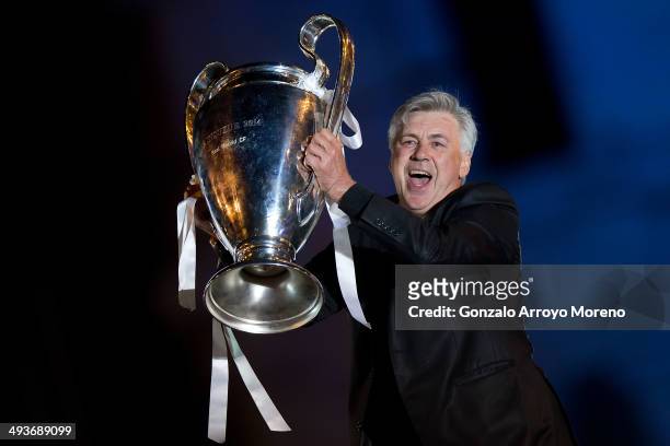 Head coach Carlo Ancelotti of Real Madrid CF holds the UEFA Champions League cup celebrating their victory on the UEFA Champions League Final match...