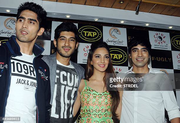 Indian Bollywood actors Vijender Singh , Mohit Marwah , Kiara Advani and Arfi Lamba pose for a photograph during a promotional event for the...