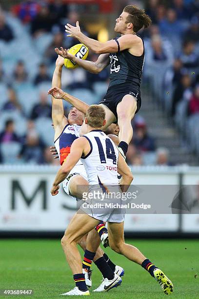 Sam Docherty of the Blues leaps for the ball during the round 10 AFL match between the Carlton Blues and the Adelaide Crows at Melbourne Cricket...