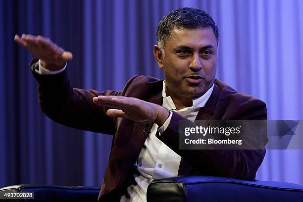 Nikesh Arora, president and chief operating officer of SoftBank Group Corp., gestures as he speaks during a SoftBank Academia lecture in Tokyo,...