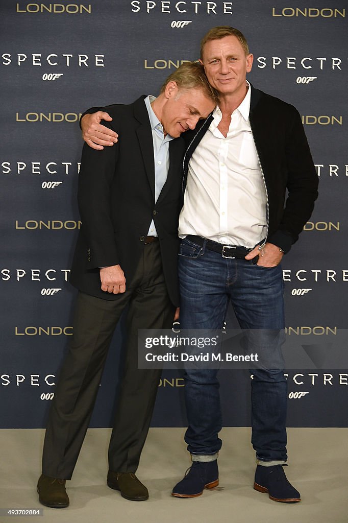 Christoph Waltz and Daniel Craig attend a photocall for 