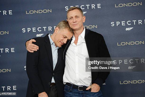 Daniel Craig and Christoph Waltz attend a photocall for "Spectre" at Corinthia Hotel London on October 22, 2015 in London, England.