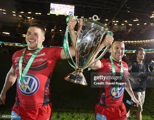 Drew Mitchell and Matt Giteau of Toulon celebrate after their victory during the Heineken Cup Final between Toulon and Saracens at the Millennium...