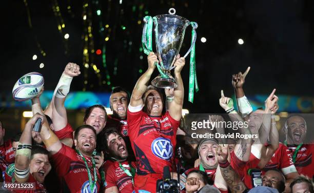 Jonny Wilkinson the Toulon captain, raises the Heineken Cup as his team mates celebrate after their victory during the Heineken Cup Final between...