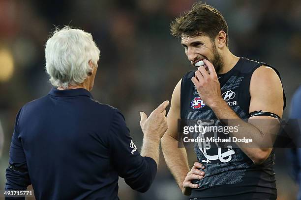 Blues coach Michael Malthouse speaks to Jarrad Waite during the round 10 AFL match between the Carlton Blues and the Adelaide Crows at Melbourne...