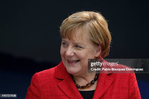 German Chancellor Angela Merkel looks on during a plenary session of the European People's Party Congress on October 22, 2015 in Madrid, Spain....