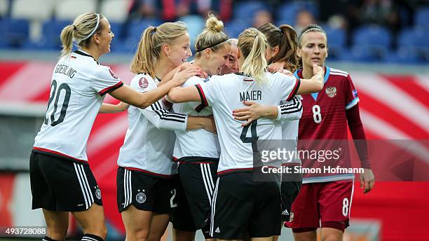 Team mates of Germany celebrate their first goal during the UEFA Women's Euro 2017 Qualifier match between Germany and Russia at BRITA-Arena on...