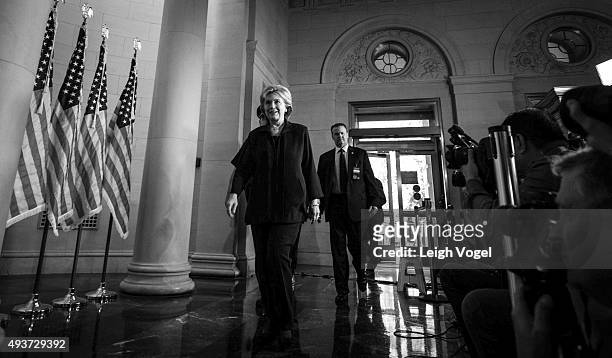 Hillary Clinton arrives at Longworth House Office Building to testify before the House Committee on Benghazi attacks on October 22, 2015 in...