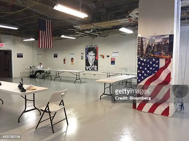 Large poster of Donald Trump, president and chief executive of Trump Organization Inc. And 2016 Republican presidential candidate, is seen on the...