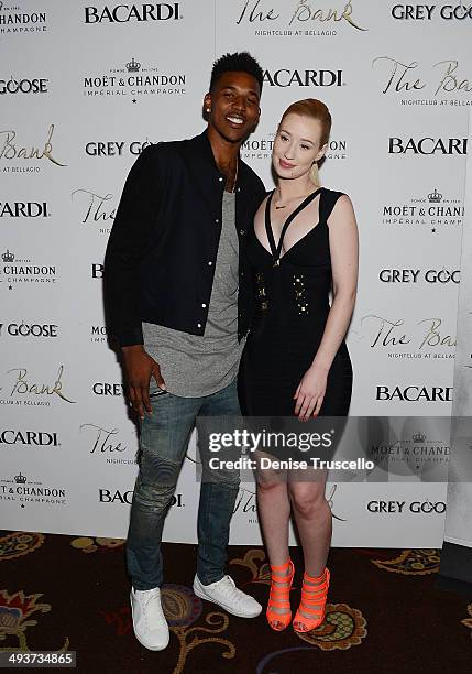 Nick Young and Iggy Azalea arrive at The Bank nightclub at the Bellagio on May 24, 2014 in Las Vegas, Nevada.