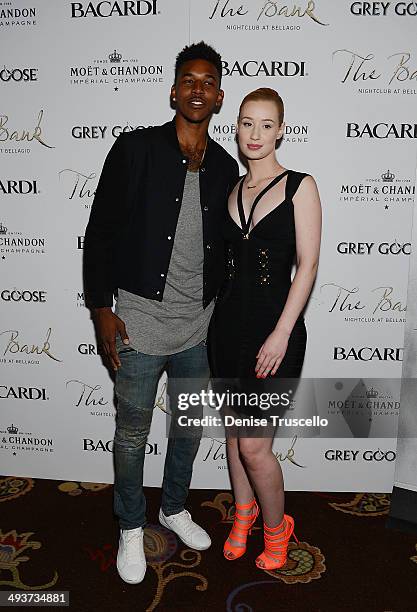 Nick Young and Iggy Azalea arrive at The Bank nightclub at the Bellagio on May 24, 2014 in Las Vegas, Nevada.